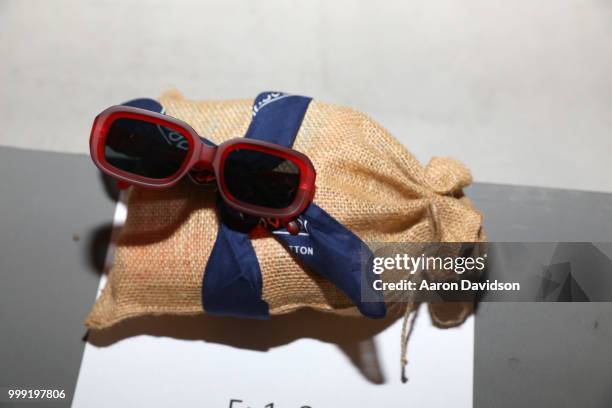 View of sunglasses on display backstage for Kaohs during the Paraiso Fashion Fair at The Setai Miami Beach on July 14, 2018 in Miami Beach, Florida.