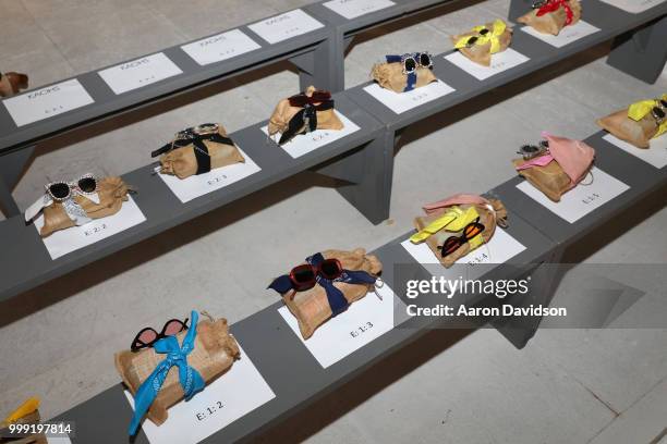 View of sunglasses on display backstage for Kaohs during the Paraiso Fashion Fair at The Setai Miami Beach on July 14, 2018 in Miami Beach, Florida.
