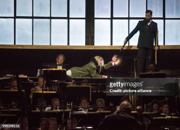 British singer Leigh Melrose as Golaud rehearsing with Canadian baritone Phillip Addis as Pelléas during the general rehearsing of the Claude Debussy...