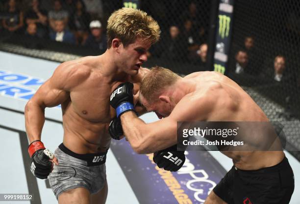 Sage Northcutt punches Zak Ottow in their welterweight fight during the UFC Fight Night event inside CenturyLink Arena on July 14, 2018 in Boise,...