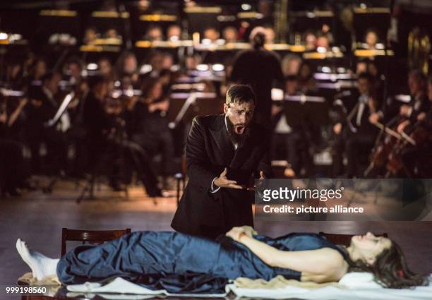 British singer Leigh Melrose as Golaud rehearsing with Canadian soprano and director Barbara Hannigan as Mélisande during the general rehearsal of...