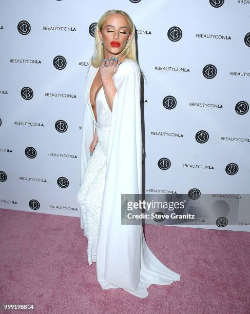 Gigi Gorgeous arrives at the Beautycon Festival LA 2018 at Los Angeles Convention Center on July 14, 2018 in Los Angeles, California.
