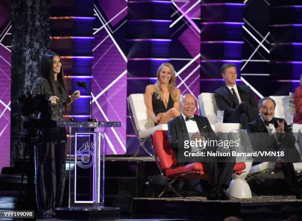 Demi Moore and Bruce Willis, Kevin Pollak, Nikki Glaser, and Edward Norton attend the Comedy Central Roast of Bruce Willis at Hollywood Palladium on...