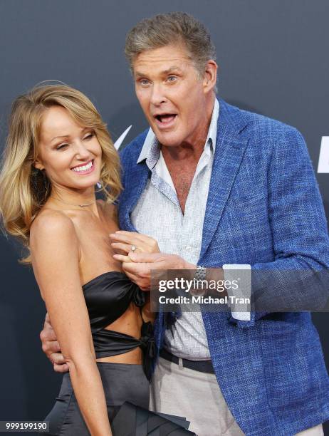 David Hasselhoff and Hayley Roberts arrive to the Comedy Central "Roast of Bruce Willis" held on July 14, 2018 in Los Angeles, California.