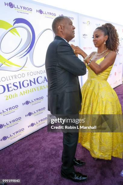 Holly Robinson Peete and husband Rodney Peete arrive at The HollyRod Foundation's 20th Annual DesignCare Gala at Private Residence on July 14, 2018...