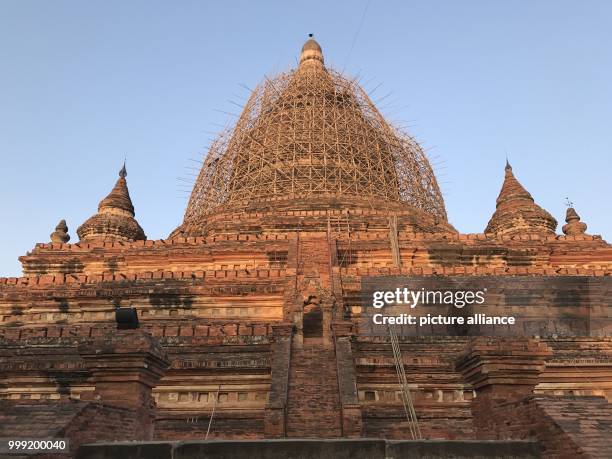 File picture dated 24 February 2017 showing one of more than 2000 buddhist pagodas with a scaffolding in the old royal city of Bagan in Myanmar....