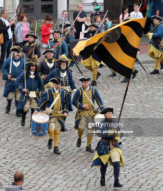 Reenactors of Swedish Carolean troops marching to a camp mass in Wismar, Germany, 18 August 2017. The Hanseatic city of Wismar conmemorates with the...