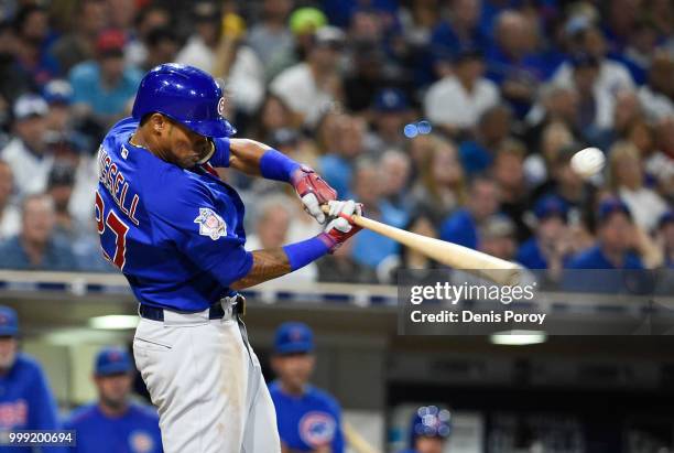 Addison Russell of the Chicago Cubs hits an RBI single during the eighth inning of a baseball game against the San Diego Padres at PETCO Park on July...