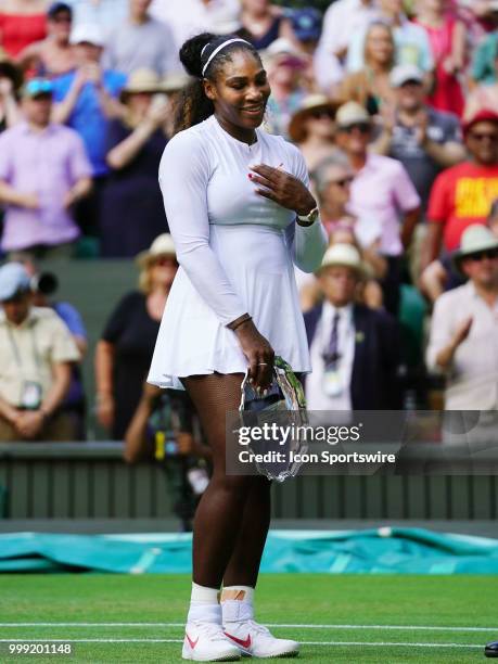 Serena Williams with the runner up trophy after her loss in the women's singles final to Angelique Kerber on July 14, 2018 at the Wimbledon...