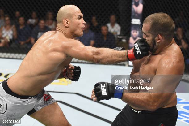 Junior Dos Santos of Brazil punches Blagoy Ivanov in their heavyweight fight during the UFC Fight Night event inside CenturyLink Arena on July 14,...