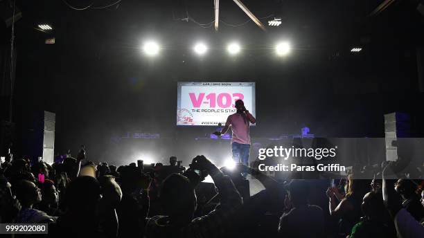 Rapper T.I. Perform onstage during 2018 V-103 Car & Bike Show at Georgia World Congress Center on July 14, 2018 in Atlanta, Georgia.