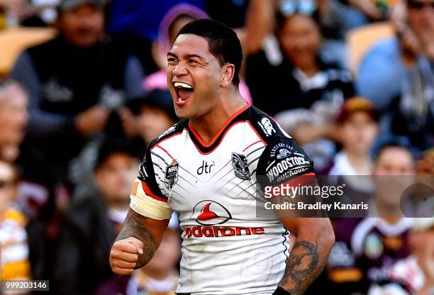 Isaac Luke of the Warriors celebrates scoring a try during the round 18 NRL match between the Brisbane Broncos and the New Zealand Warriors at...