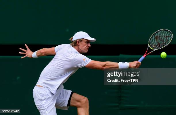 Kevin Anderson of South Africa in action against John Isner of the United States in the semi final of the gentlemen's singles at the All England Lawn...