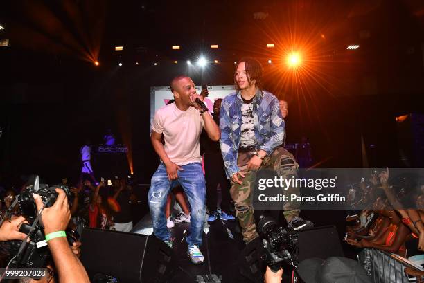 Rapper T.I. And son Domani Harris perform onstage during 2018 V-103 Car & Bike Show at Georgia World Congress Center on July 14, 2018 in Atlanta,...