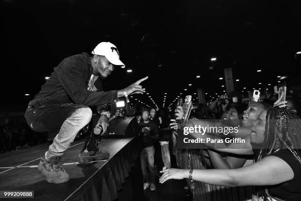 Rapper Yung Booke perform onstage during 2018 V-103 Car & Bike Show at Georgia World Congress Center on July 14, 2018 in Atlanta, Georgia.