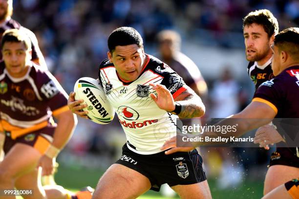 Isaac Luke of the Warriors takes on the defence during the round 18 NRL match between the Brisbane Broncos and the New Zealand Warriors at Suncorp...