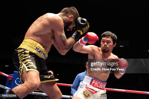 Manny Pacquiao of the Phillipines and Lucas Matthysse of Argintine in action on July 15, 2018 in Kuala Lumpur, Malaysia.