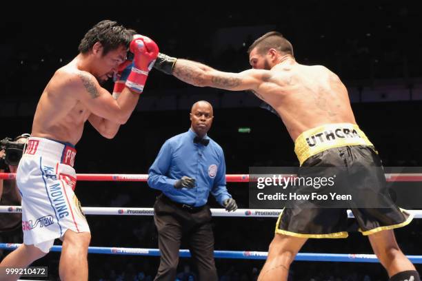 Manny Pacquiao of the Phillipines and Lucas Matthysse of Argintine in action on July 15, 2018 in Kuala Lumpur, Malaysia.