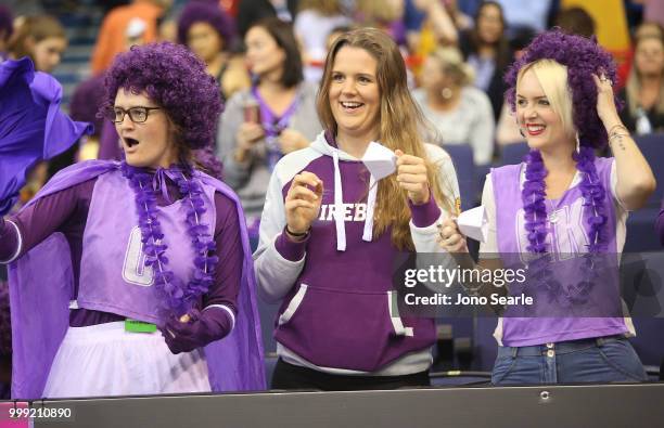 Firebirds fans cheer after the win during the round 11 Super Netball match between the Firebirds and the Giants at Brisbane Entertainment Centre on...