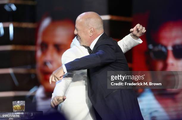 Joseph Gordon-Levitt and Bruce Willis speak onstage during the Comedy Central Roast of Bruce Willis at Hollywood Palladium on July 14, 2018 in Los...