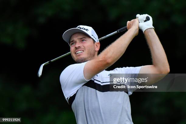 Bronson Burgoon hits his shot on the 12th hole during the third round of the John Deere Classic on July 14, 2018 at the TPC Deere Run in Silvis,...