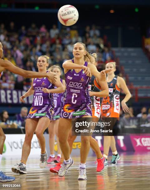 Mahalia Cassidy of the Firebirds passes the ball during the round 11 Super Netball match between the Firebirds and the Giants at Brisbane...