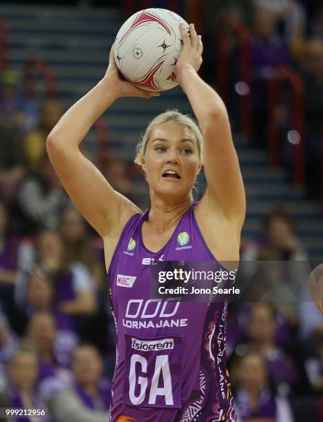 Gretel Tippett of the Firebirds looks to pass during the round 11 Super Netball match between the Firebirds and the Giants at Brisbane Entertainment...