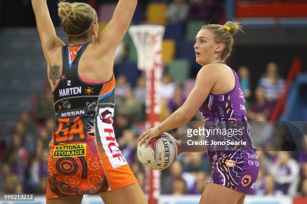 Gabi Simpson of the Firebirds looks to pass during the round 11 Super Netball match between the Firebirds and the Giants at Brisbane Entertainment...