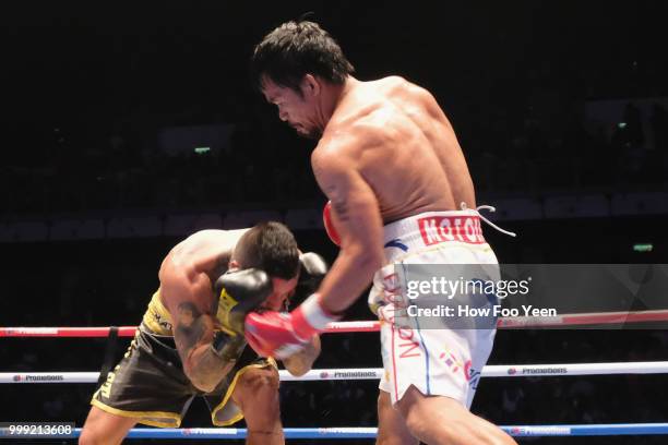 Manny Pacquiao of the Phillipines and Lucas Matthysse of Argintine in action on July 15, 2018 in Kuala Lumpur, Malaysia.