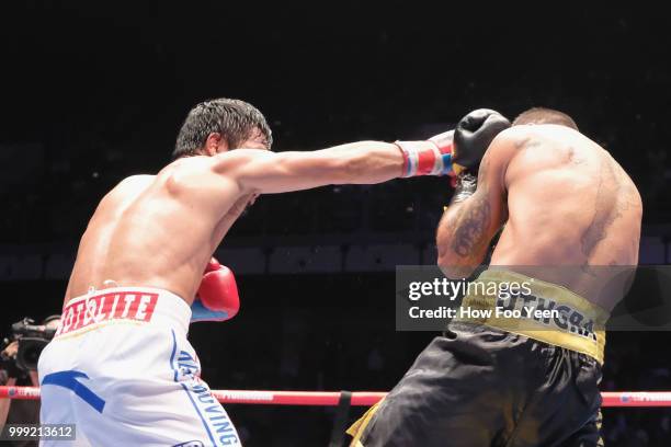 Manny Pacquiao of the Phillipines and Lucas Matthysse of Argintine in action on July 15, 2018 in Kuala Lumpur, Malaysia.