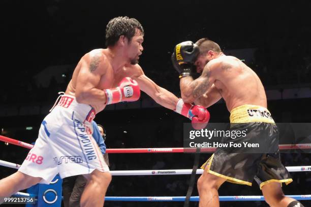 Manny Pacquiao of the Phillipines and Lucas Matthysse of Argintine in action on July 15, 2018 in Kuala Lumpur, Malaysia.