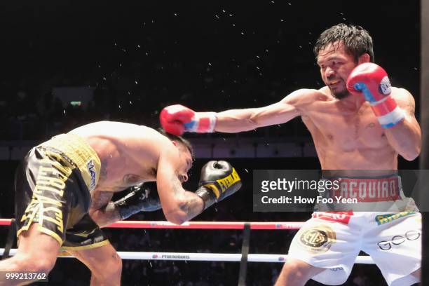 Manny Pacquiao of the Phillipines and Lucas Matthysse of Argintine in action on July 15, 2018 in Kuala Lumpur, Malaysia.