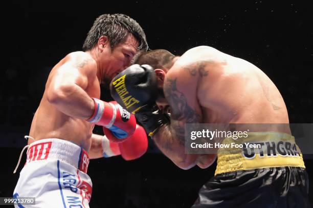 Manny Pacquiao of the Phillipines and Lucas Matthysse of Argintine in action on July 15, 2018 in Kuala Lumpur, Malaysia.