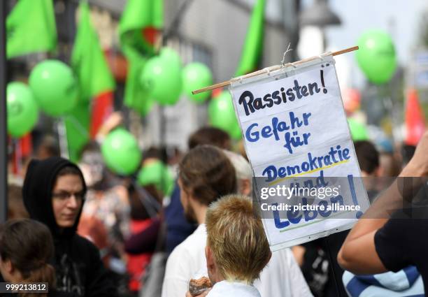 Counter protestors protest against a neo-Nazi march on the occasion of the 30th anniversary of the death of Hitler's deputy Rudolf Hess at the...