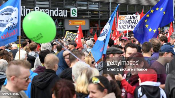 Counter protestors protest against a neo-Nazi march on the occasion of the 30th anniversary of the death of Hitler's deputy Rudolf Hess at the...