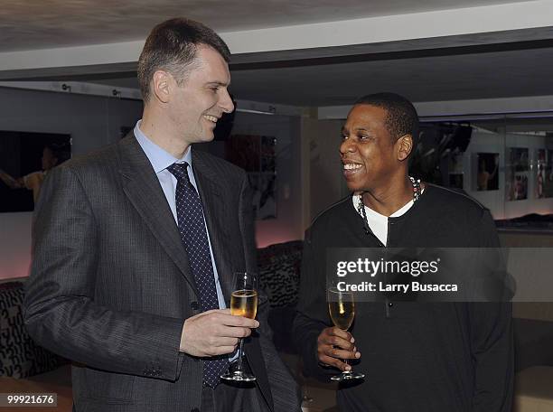 Nets owner Mikhail Prokhorov with cultural icon and Nets investor JAY-Z celebrate Prokhorov's purchase of the team at lunch today at JAY-Z's 40/40...