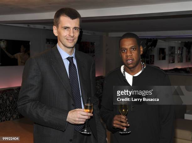 Nets owner Mikhail Prokhorov with cultural icon and Nets investor JAY-Z celebrate Prokhorov's purchase of the team at lunch today at JAY-Z's 40/40...