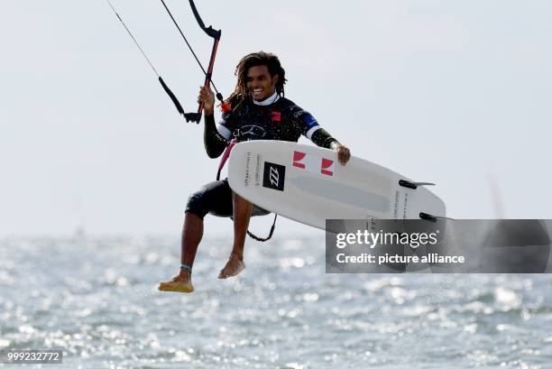 The Kite-Surfer Jan Marcos Riveras of the Dominican Republic shows a jump in the 'Strapless Freestyle' competition during the Kitesurf World Cup at...