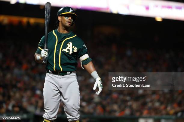 Khris Davis of the Oakland Athletics reacts after he was struck out during the sixth inning of his MLB baseball game against the San Francisco Giants...