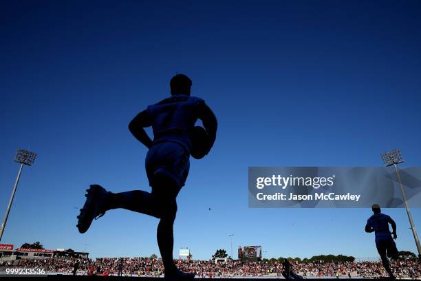 Ben Hunt of the Dragons makes his way onto the field to warm-up prior to the round 18 NRL match between the St George Illawarra Dragons and the Wests...