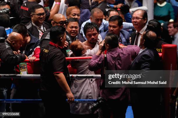 Philippine's Manny Pacquiao celebrated after winning fight with Argentina's Lucas Matthysse during their World welterweight boxing championship title...