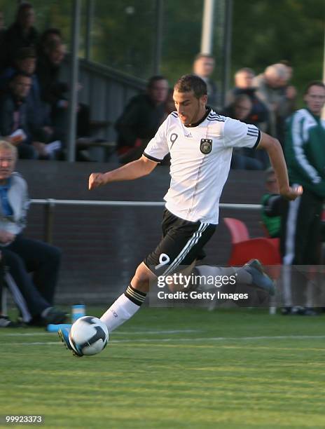 Cenk Tosun of Germany runs with the ball during the U19 Championship Elite Round match between Germany and Poland at Bakenbos on May 18, 2010 in...