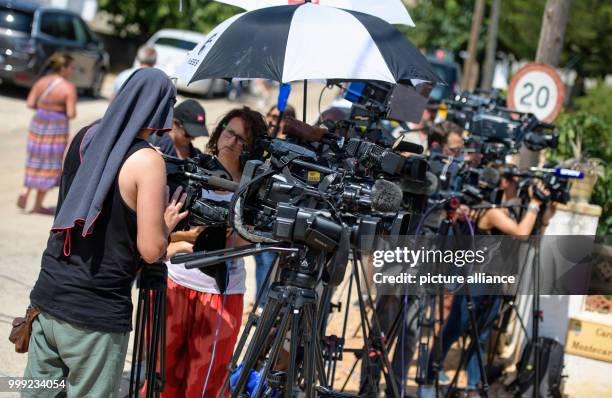 Reporters gathered on the street where a residential house exploded on 16 August 2017 in Alcanar, Spain, 19 August 2017. The explosion is connected...