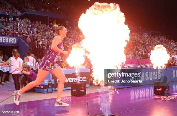 Gabi Simpson of the Firebirds heads onto court during the round 11 Super Netball match between the Firebirds and the Giants at Brisbane Entertainment...