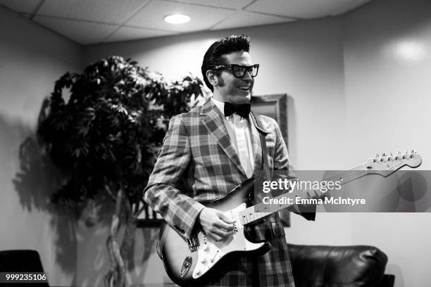 Elvis Presley impersonator Dean Z dressed as Buddy Holly attends the Las Vegas Elvis Festival at Sam's Town Hotel & Gambling Hall on July 14, 2018 in...