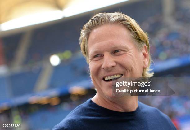 Hamburg manager Markus Gisdol smiles during the German Bundesliga soccer match between Hamburger SV and FC Augsburg in the Volksparkstadion in...