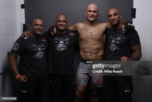 Junior Dos Santos of Brazil poses with his team for a post fight portrait during the UFC Fight Night event inside CenturyLink Arena on July 14, 2018...