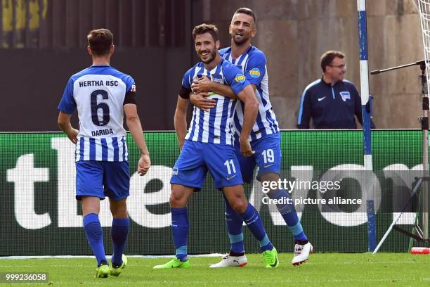 Vladimir Darida , Mathew Leckie and Vedad Ibsevic of Hertha BSC celebrate after the 2-0 goal during the German Bundesliga soccer match between Hertha...