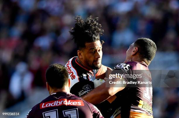 James Gavet of the Warriors takes on the defence during the round 18 NRL match between the Brisbane Broncos and the New Zealand Warriors at Suncorp...