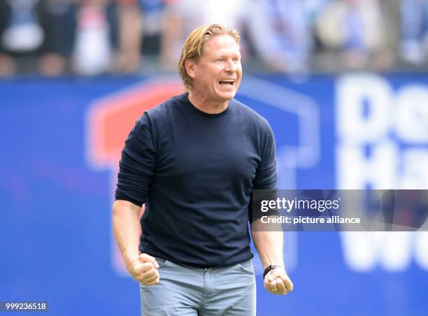 Hamburg's coach Markus Gisdol gives instructions during the German Bundesliga soccer match between Hamburger SV and FC Augsburg in the...